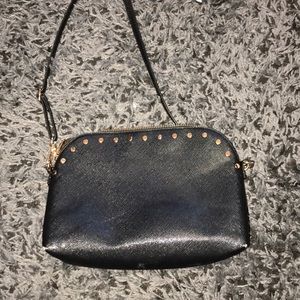 Black crossbody bag with gold detailing